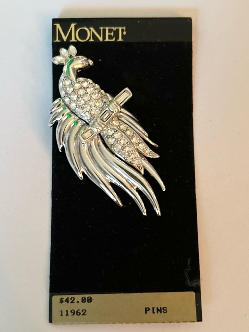 Monet Silver and Clear Rhinestone Peacock Pin